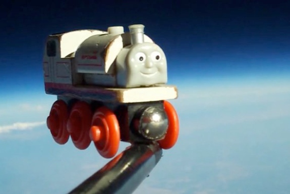 Father, Son Launch Toy Train Into Outter Space